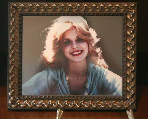Alexis Somers keeps framed photos of her
mother, Michele MacNeill, around
her home in South Jordan on Aug. 24, 2012.
MacNeill died in 2007. Jury selection began
Tuesday in the trial of her husband, Martin
MacNeill, who is charged with murdering her.
(Photo: Kristin Murphy, Deseret News)