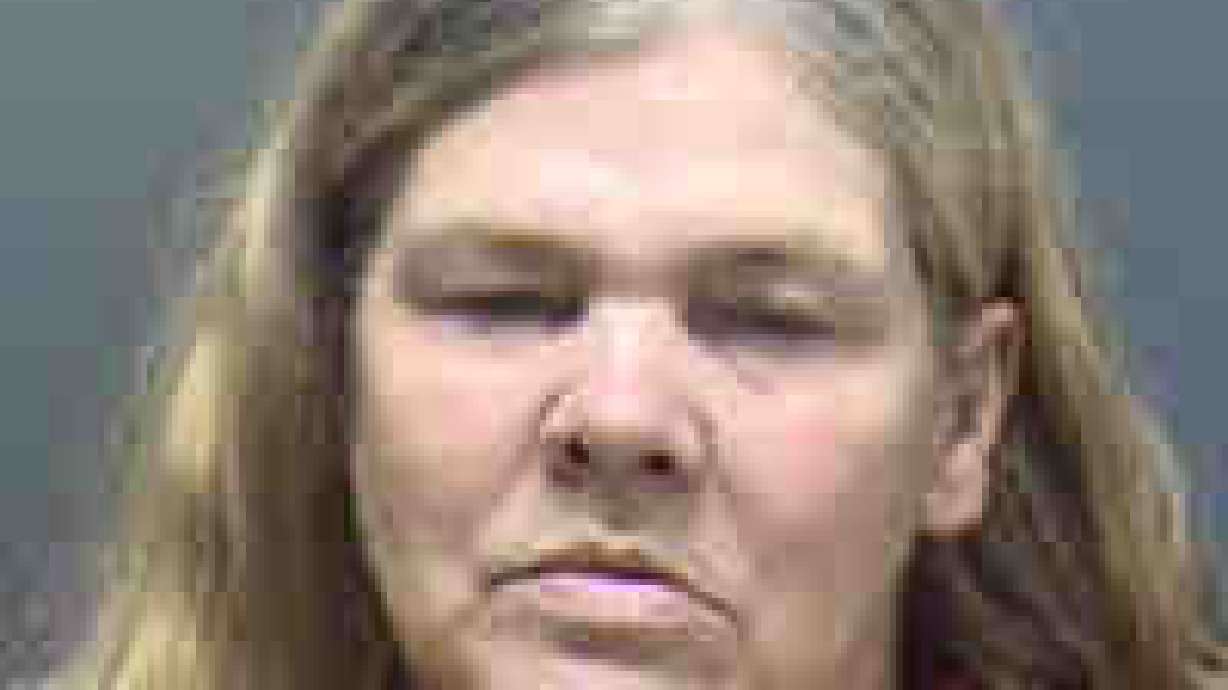 Arrests follow death of child wrapped in blanket