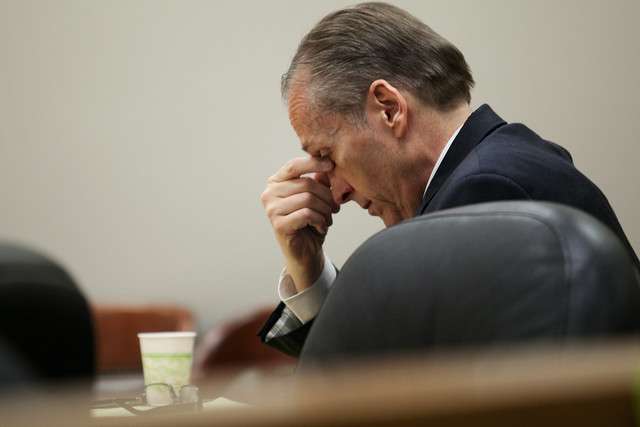 Martin MacNeill rubs his eyes during his trial in Provo's 4th District Court on Tuesday, Oct. 29, 2013. MacNeill is charged with murder in the 2007 death of his wife, Michele MacNeill. (Photo: Mark Johnston)