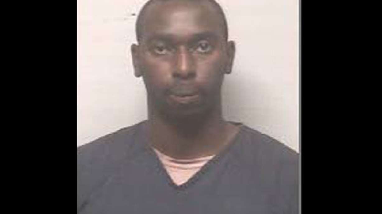 Drunk man accused of dangling child from overpass