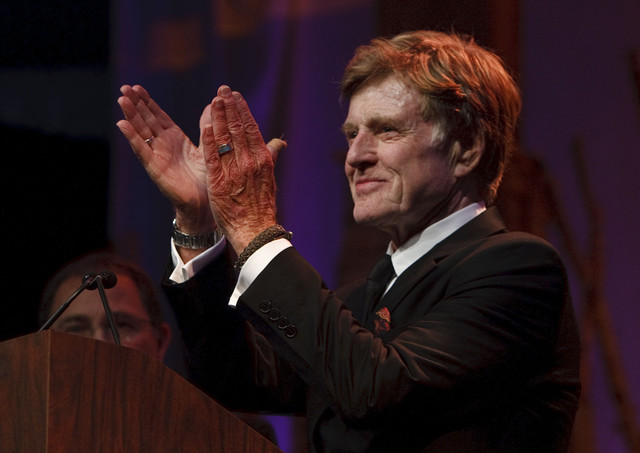 Governor Gary Herbert presents Robert Redford a gift. For all his contributions to the state of Utah, Robert Redford was recognized and honored by Governor Gary Herbert at a gala in his honor, "The Governor's Salute to Robert Redford: A Utah Tribute to an American Icon" at the Grand America Hotel, Saturday, November 9, 2013. Redford is an actor, director, producer, philanthropist, businessman, environmentalist, and founder of the Sundance Resort, the Sundance catalog, and the Sundance Institute which hosts the Sundance Film Festival. (Submission date: 11/09/2013) (Photo credit: Leah Hogsten)