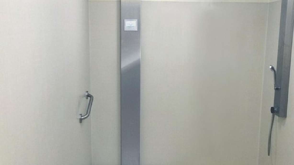 Futuristic water-recycling shower cuts bills by over $1K