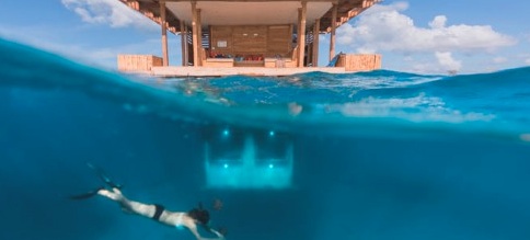Sleeping with the fish: Underwater hotel room opens on African island
