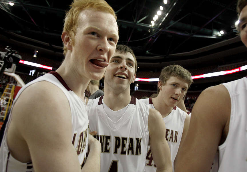 Lone Peak High School's T.J. Haws, left, and Nick Emery celebrate Lone Peak High School's win against Brighton High School in the Class 5A boys basketball championship game at the Maverik Center in West Valley on Saturday, March 3, 2012.