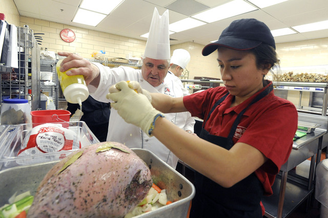 High school students, U. chefs work with Salvation Army to bring Thanksgiving dinner to needy
