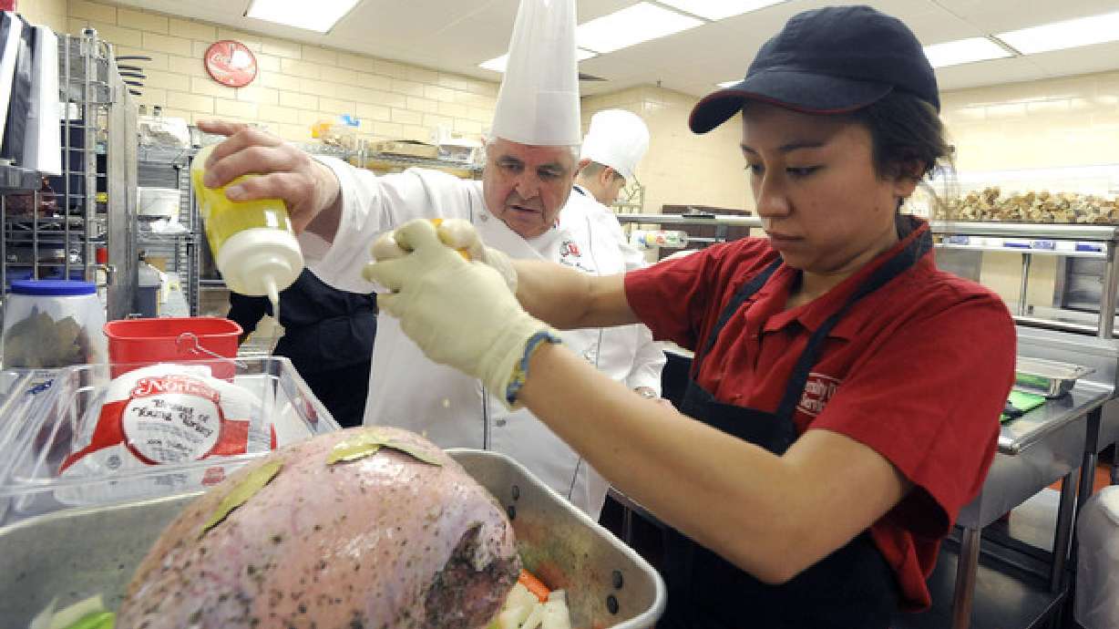 High school students, U. chefs work with Salvation Army to bring Thanksgiving dinner to needy