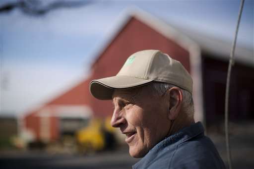 Dennis Hess poses for a photograph at his farm
Monday, Nov. 4, 2013, in Litiz, Pa. Hess runs
an unattended farm stand on the honor system.
"When people from New York or New Jersey come
up," said Hess, "they are amazed that this kind
of thing is done anymore."