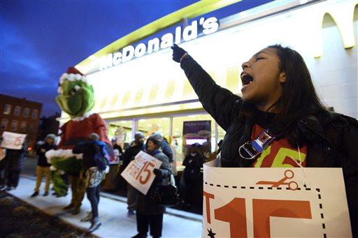 Selma Aly of Chicago, rallies for better wages
outside a McDonald's restaurant in Chicago,
Thursday, Dec., 5, 2013. Demonstrations planned
in 100 cities are part of push by labor unions,
worker advocacy groups and Democrats to raise
the federal minimum wage of $7.25.