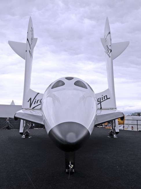 Virgin Galactic's SpaceShipTwo is featured in a
static display at Farnborough this week. Likely
to steal the show, the aircraft is making its
European debut with a few modifications. Virgin
Group founder Sir Richard Branson is expected
to announce an expansion for the business's
space tourism research and development on
Wednesday.