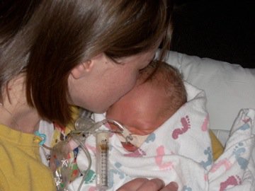 Erin Koelliker kisses Henry. (Photo: Koelliker family)