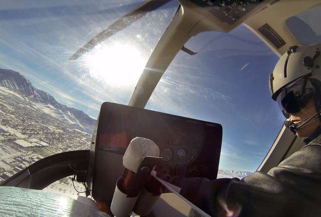 Pilot Jeff Thomas views the city of Tooele in the AirMed helicopter as
University of Utah Health Care and Tooele city and county opened the
newest AirMed base on Tuesday, Dec. 10, 2013. The new base will be
staffed 24 hours a day with three AirMed team members and one
helicopter.