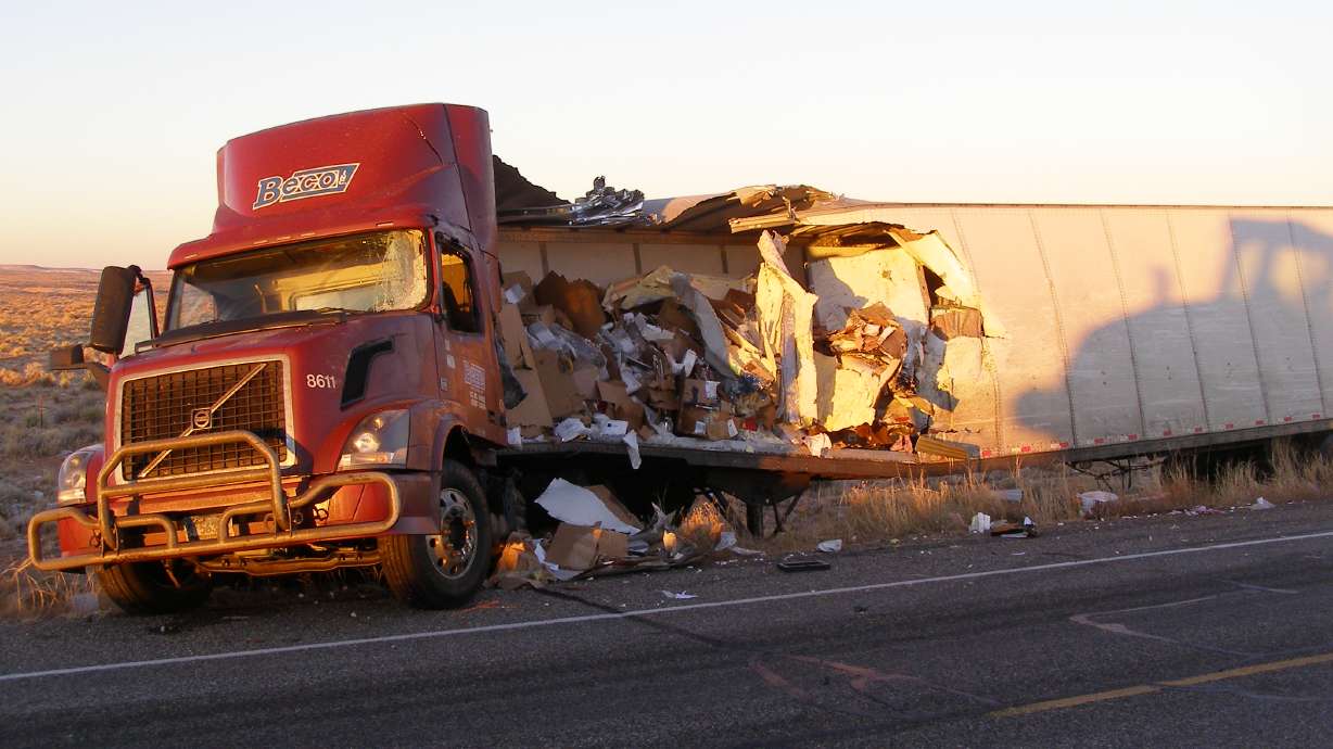 1 killed in head-on collision between semitrucks