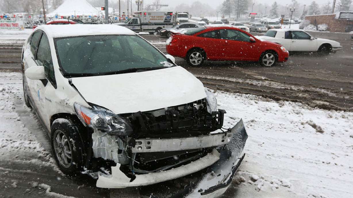 Slick roads can cause hazardous driving conditions and fender benders like this one in Sandy on Dec. 19, 2013.
