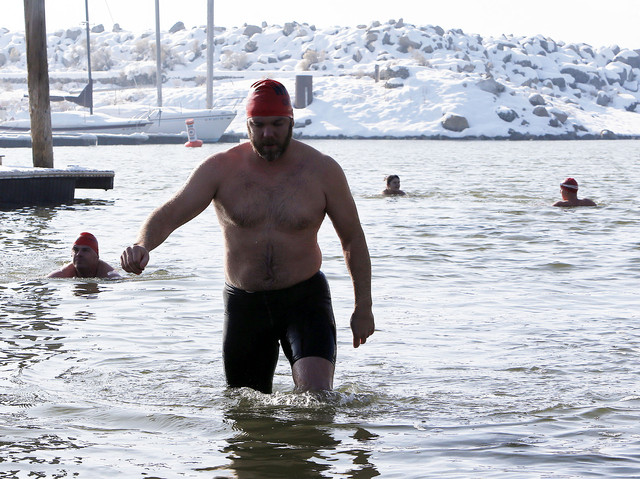 Goody Tyler IV exits the water during the 
Wasatch Front Polar Bear Club New Year's Day 
swim at the Great Salt Lake Marina on Wednesday, 
Jan. 1, 2014. (Photo: Ravell Call, Deseret News)