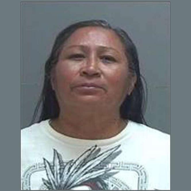 Woman charged in fatal stabbing near shelter