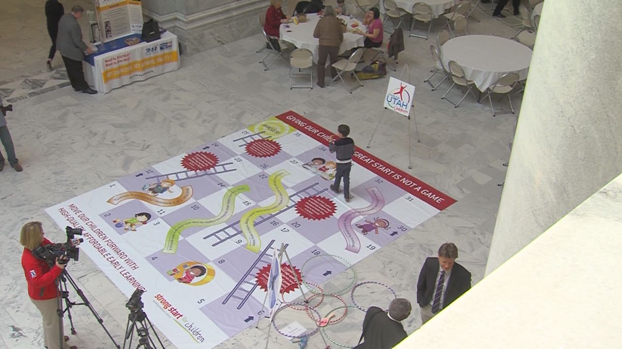 Group plays Chutes & Ladders at Capitol to promote preschool education