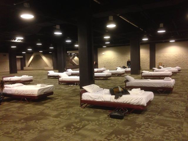 CNN Video Producer Jo Parker slept alongside other female staffers in 
the basement of the Omni Hotel in Atlanta, where all rooms were 
booked. Male CNN staffers had less luxurious accommodations in the 
employee gym.