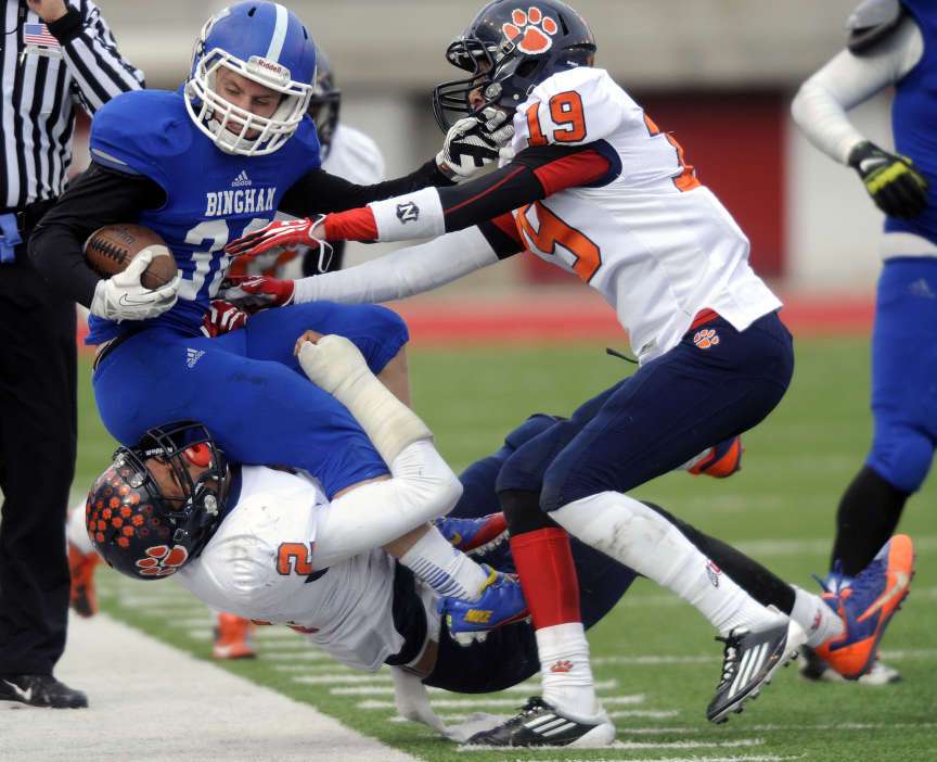Bingham's running back Scott Nichols is forced out of bounds by the
Brighton defense during the 5A State Championships at Rice Eccles
Stadium on Friday, November 22, 2013.