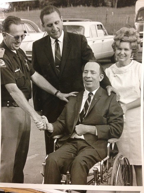 A UHP trooper, President Thomas S. Monson, Dorothy Warren Charles
Warren's first wife and Warren are shown at the commencement of
Chuck Warren Day in a Deseret News photograph. (Photo: Celeste
Tholen Rosenlof)