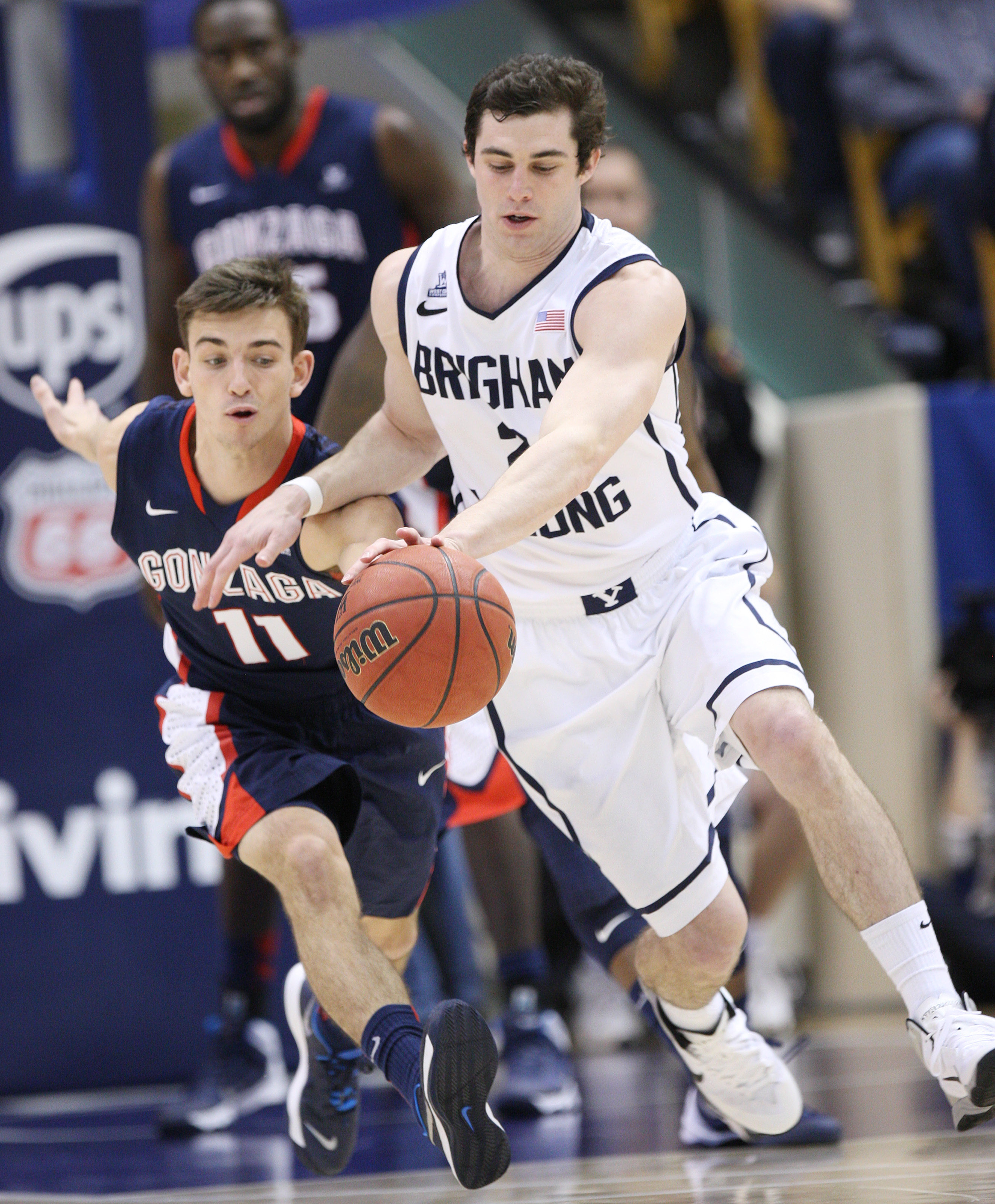Brigham Young Cougars guard Matt Carlino (2) steals the ball from Gonzaga Bulldogs guard David Stockton (11) during NCAA basketball in Provo Thursday, Feb. 20, 2014. BYU won 73-65. (Jeffrey D. Allred, Deseret News)