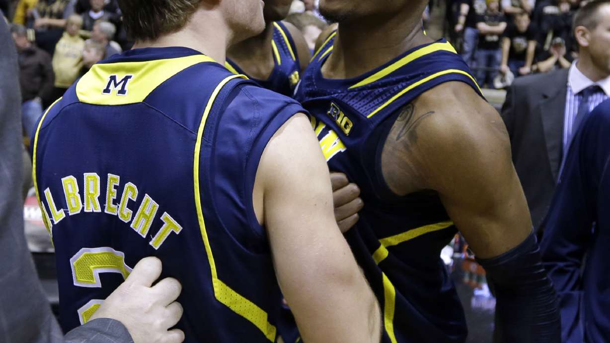 No. 16 Michigan escapes Purdue with 77-76 OT win