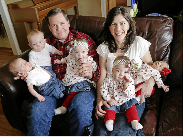 Couple adopts triplets, gives birth to twins in the same year