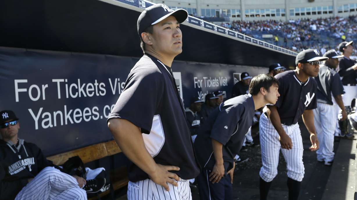 Tanaka goes 2 shutout innings in 1st Yankees game