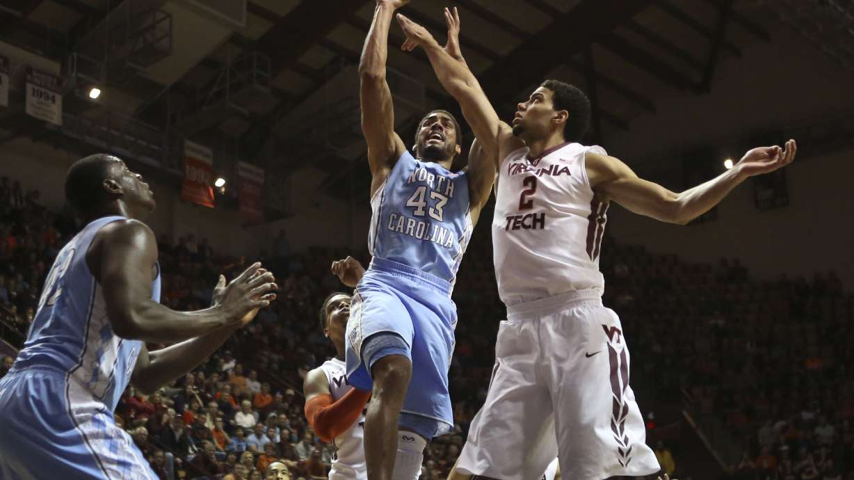 McAdoo leads No. 19 NCarolina past Va Tech 60-56