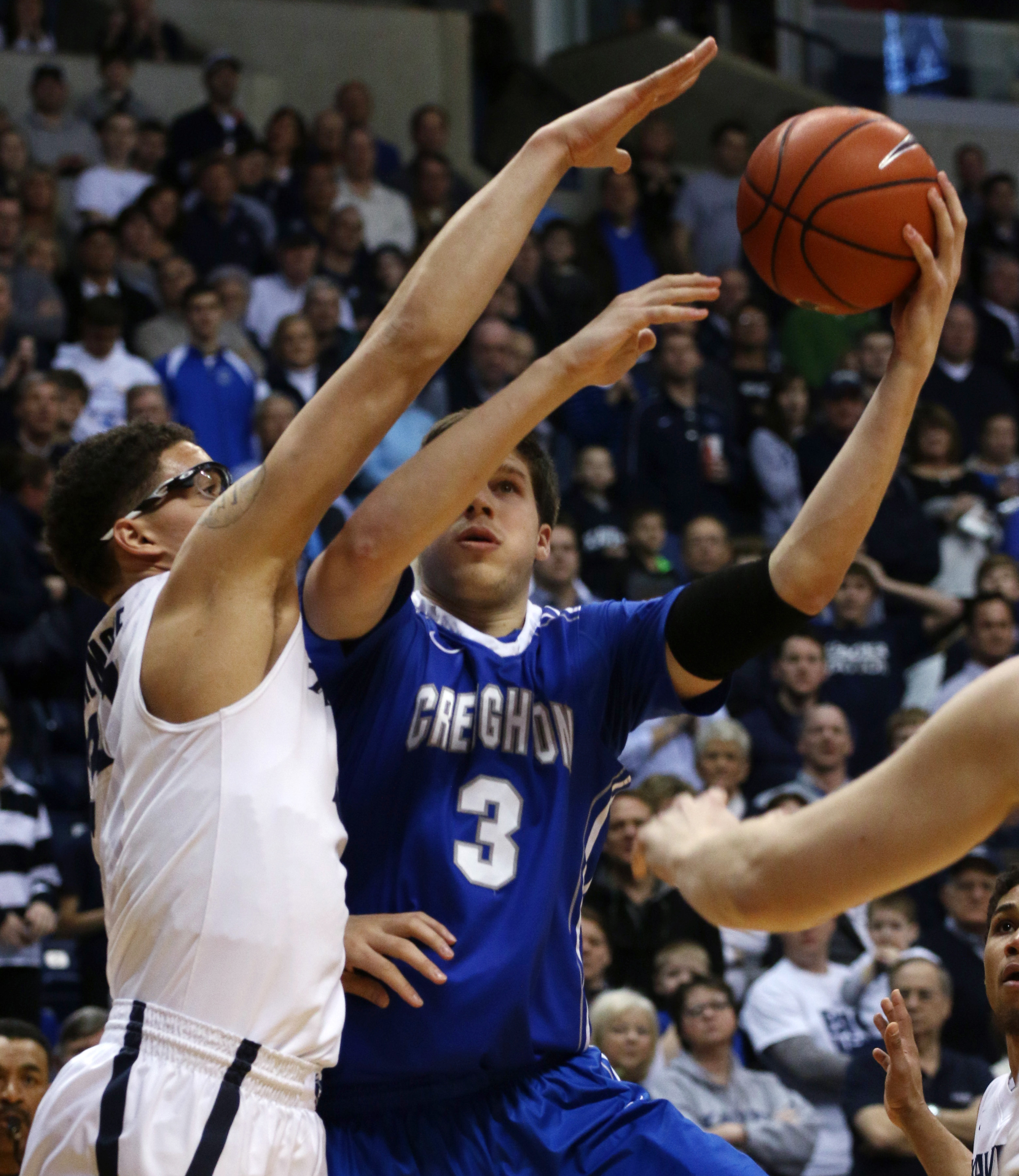 Martin leads Xavier over No. 9 Creighton 75-69