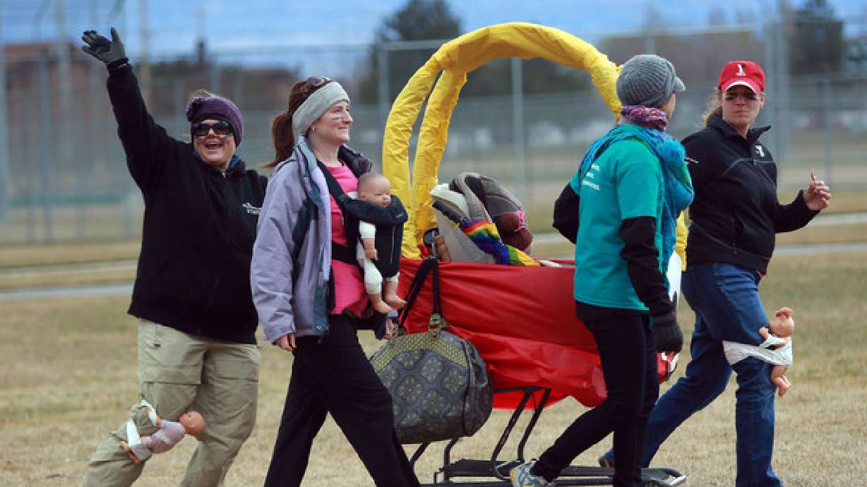 'Cart Dart' participants dress up, compete to raise money for children
