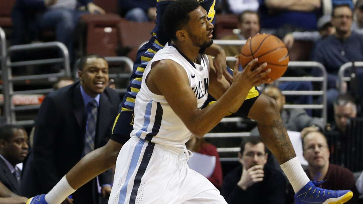 No. 8 Villanova beats Marquette 73-56