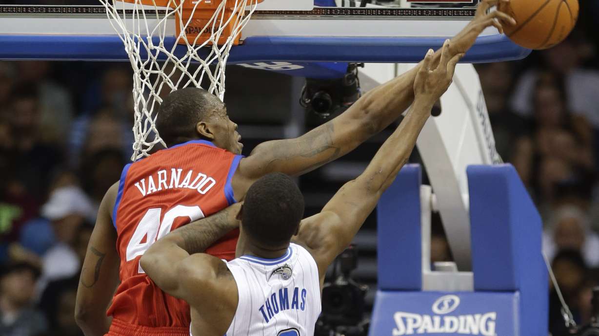 Harris has 31 and Magic extend 76ers' skid, 92-81