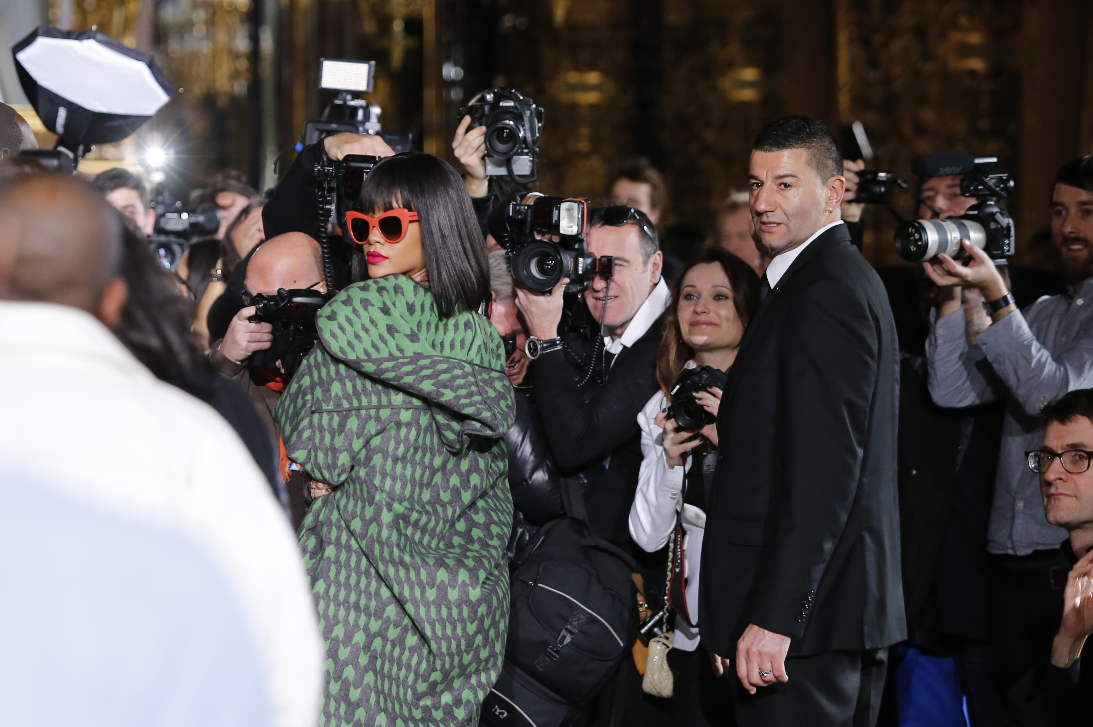 Singer and fashion designer Rihanna acknowledges applause at the end of her  Fall-Winter 2017/2018 ready-to-wear collection for Fenty as part of Paris  Fashion Week, presented in Paris, Monday March 6, 2017. (AP