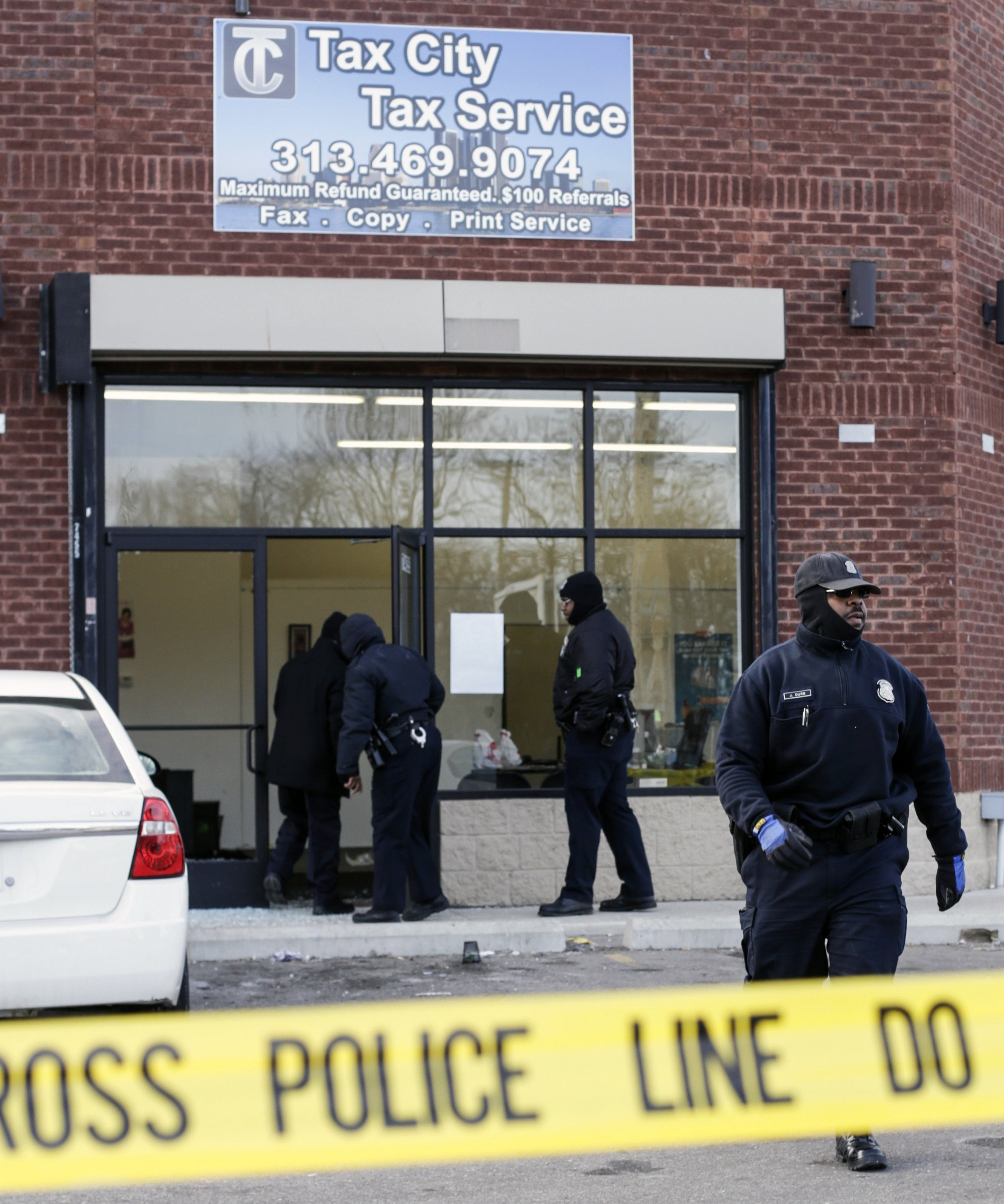 Man charged in shooting at Detroit tax business