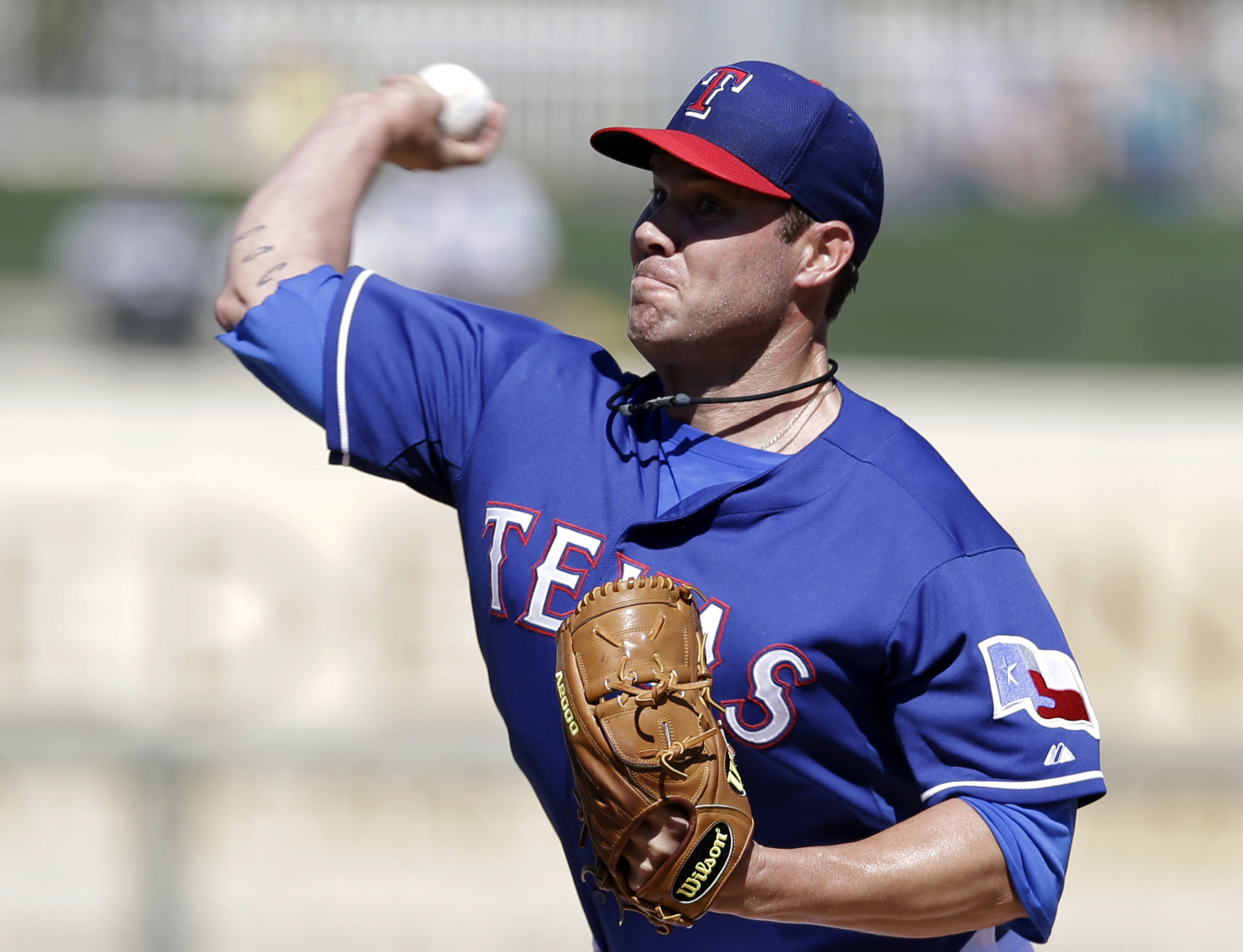 Texas' Colby Lewis struggles in return to mound