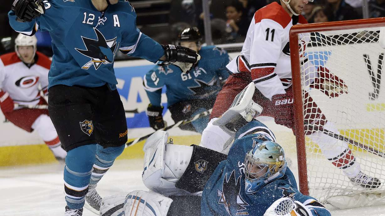 Hurricanes beat Sharks 3-2 in OT