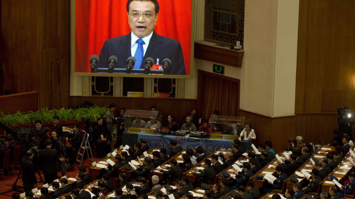 China premier promises to advance economy reforms