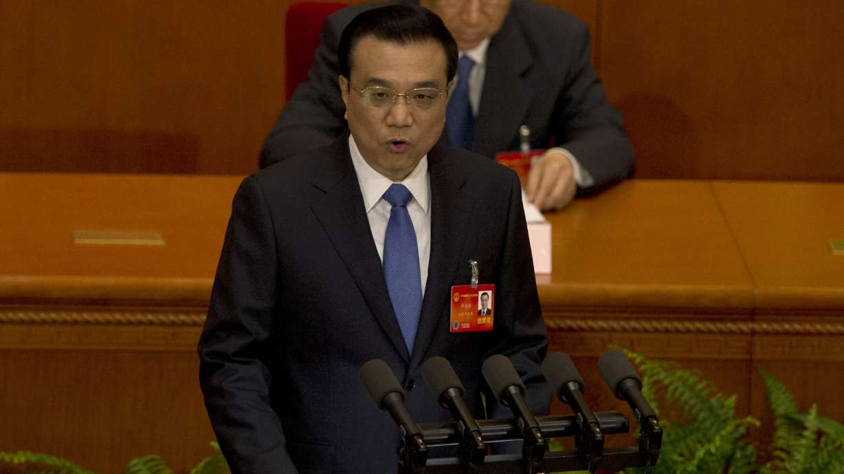 China vows tough reforms, stronger defense