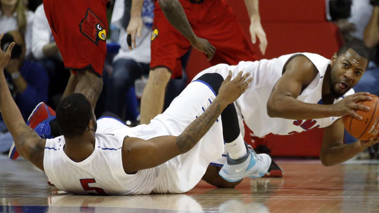 No. 18 SMU 1st home loss, 84-71 to No. 11 Cards