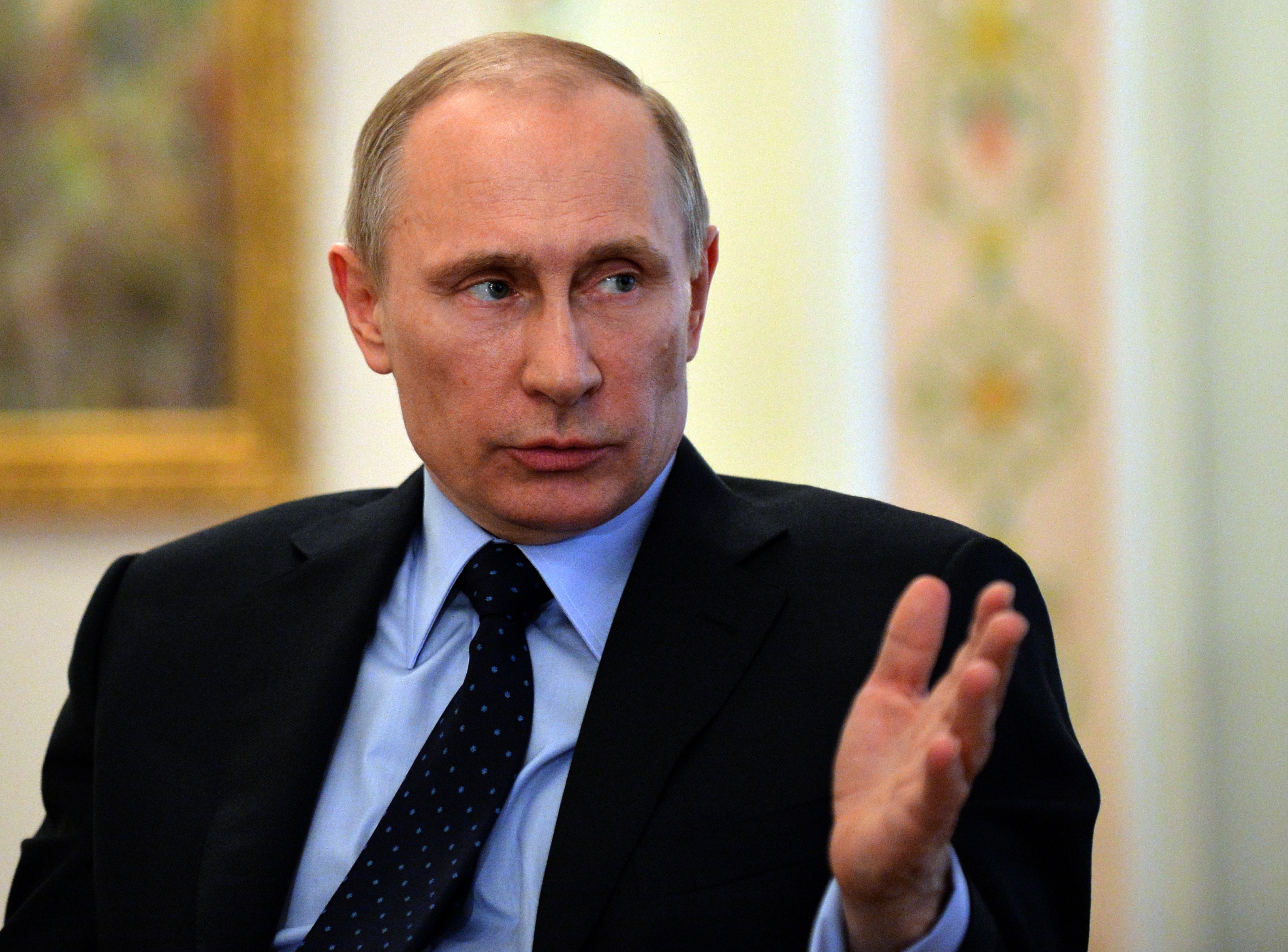 Putin uses carrot and stick to dominate neighbors