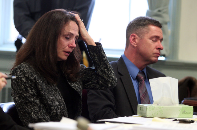 Elizabeth and Sean Canning listen to testimony
in Morris County Superior Court in Morristown,
N.J., Tuesday, March 4, 2014. Their daughter
Rachel, 18, is suing them for financial support
and college tuition after she claims they threw
her out of the home.