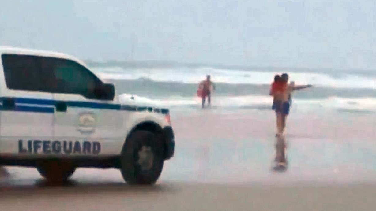 Mother who drove into ocean of Fla. hospitalized