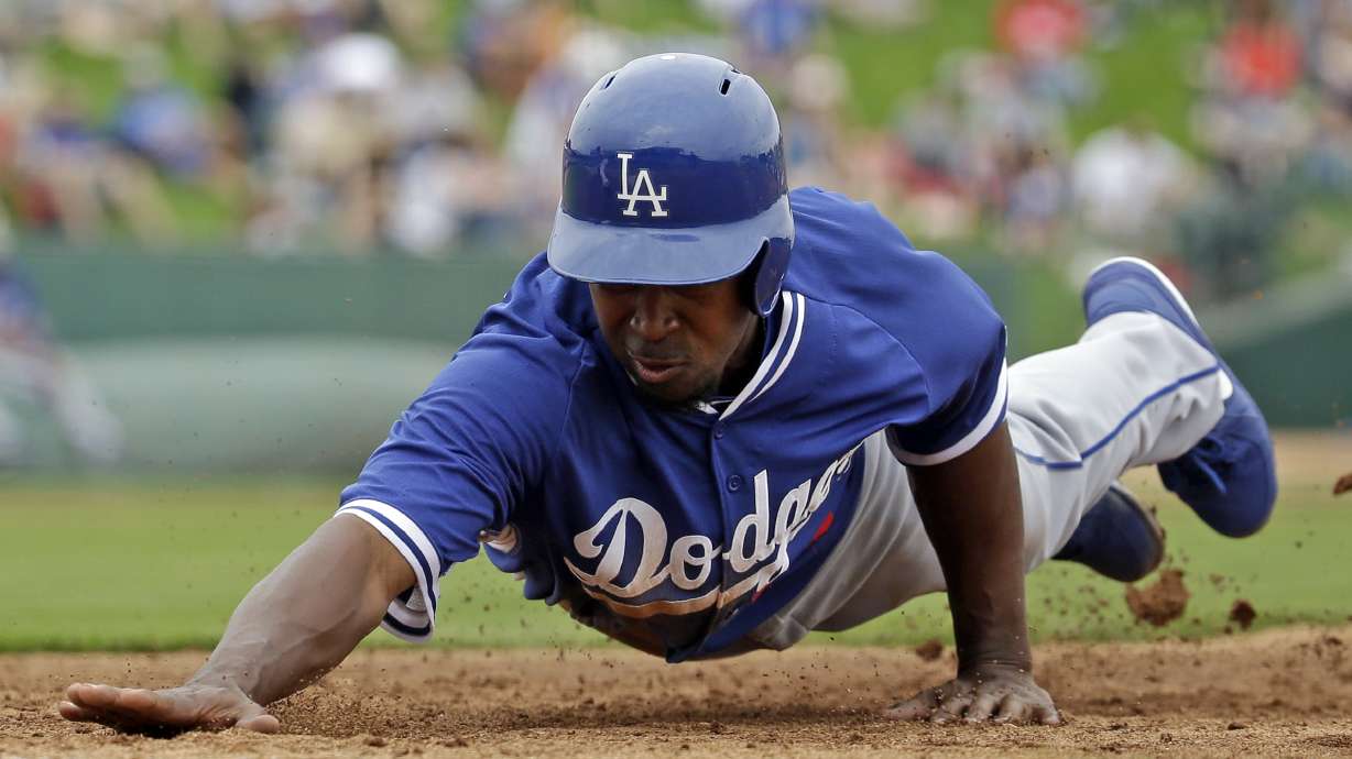 Wilson, Haren sharp, Angels and Dodgers tie in 10