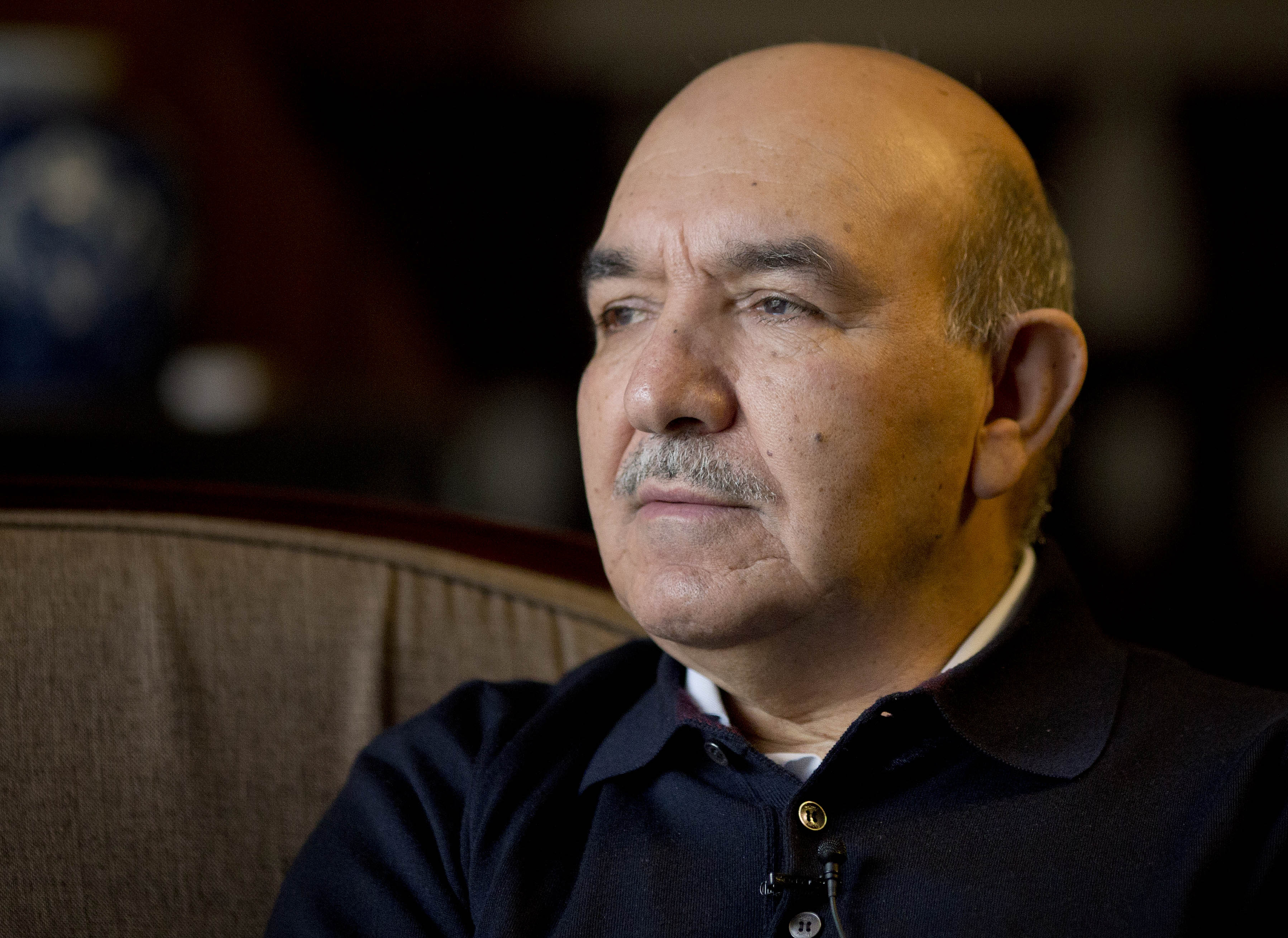 AP Interview: Karzai's brother on Afghan vote