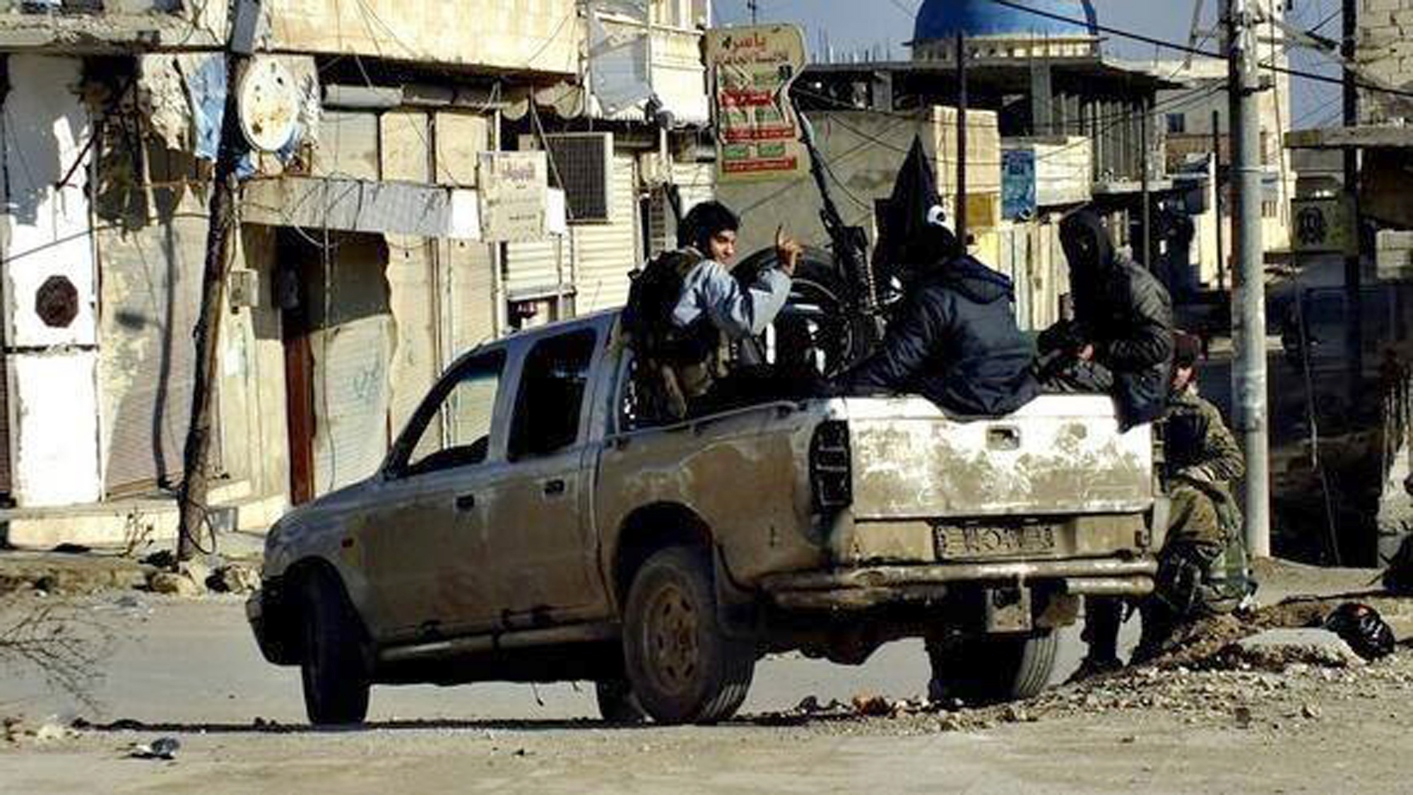 Militant grip transforms, terrorizes Syrian city