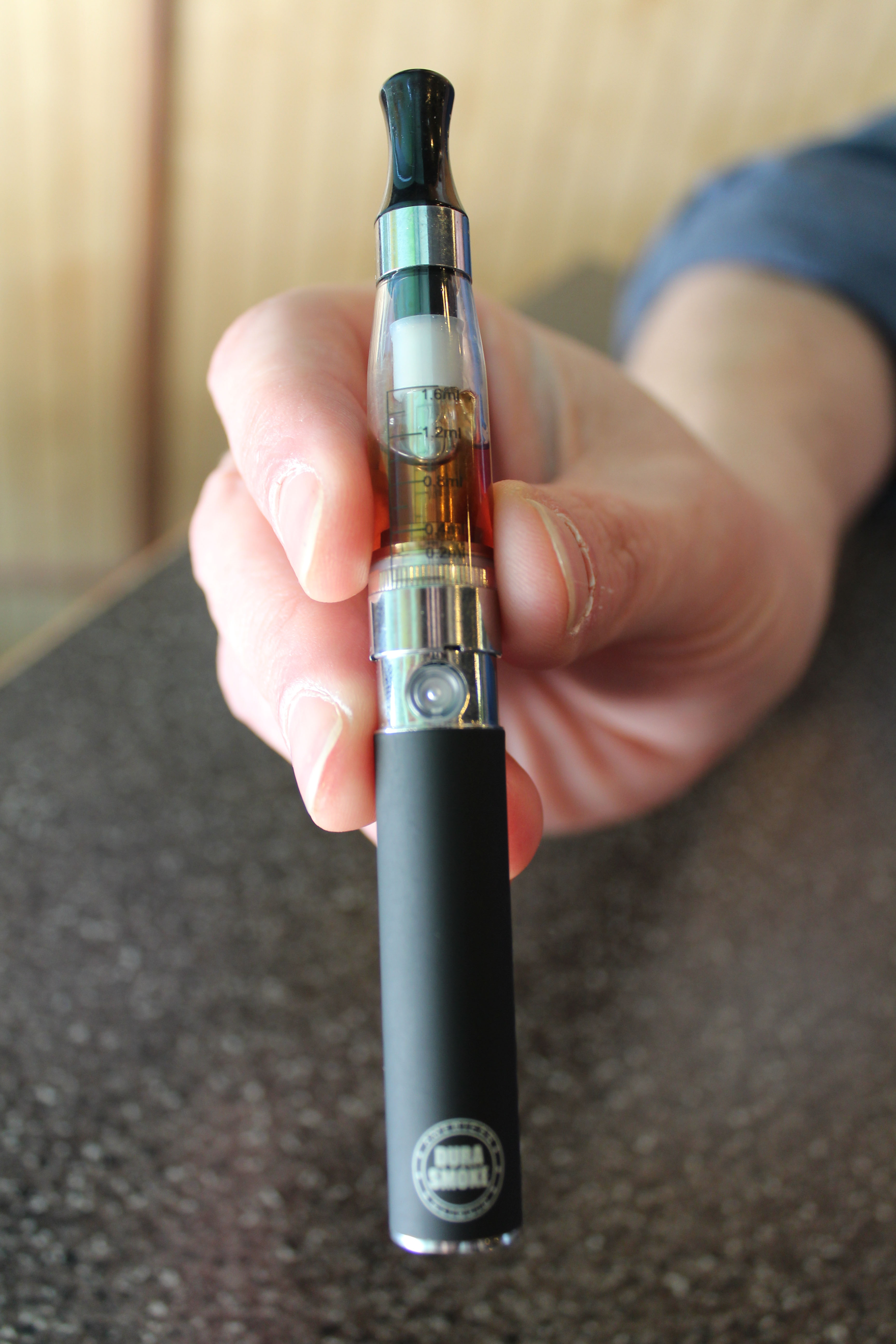 E-cigarettes ignite debate over regulation, sales