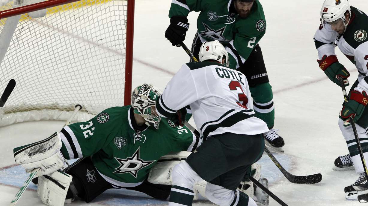 Cole's late breakaway goal lifts Stars over Wild