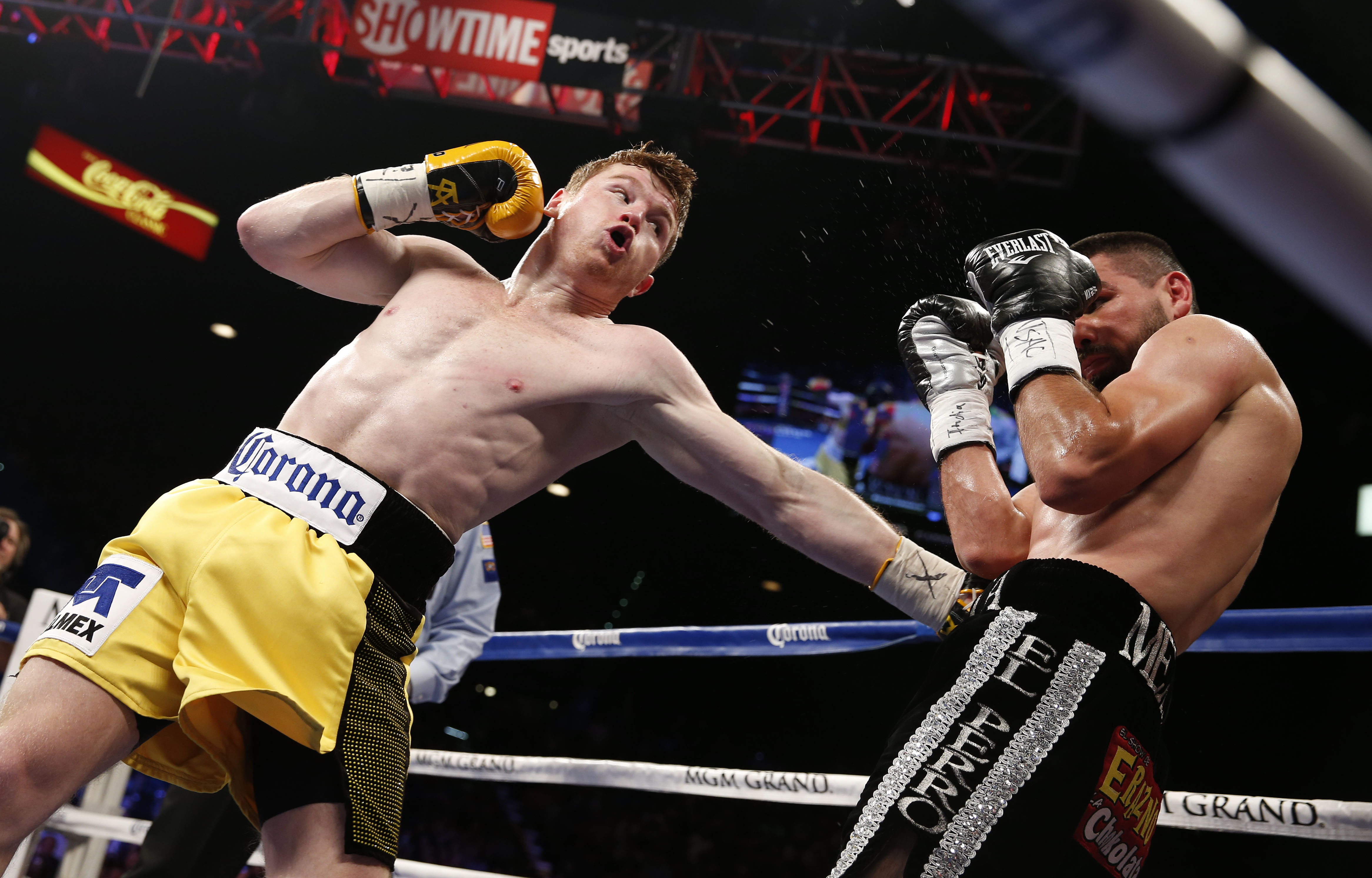 Alvarez rebounds by stopping Angulo in 10th