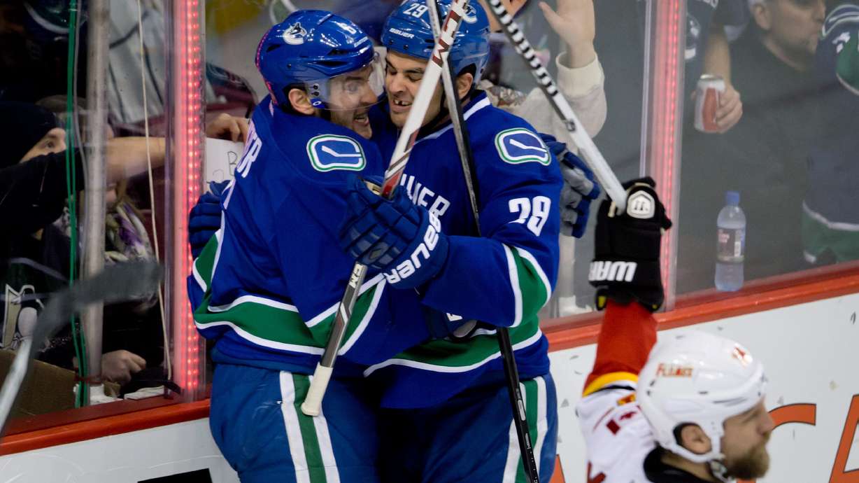 Canucks end 4-game skid with 2-1 win over Flames