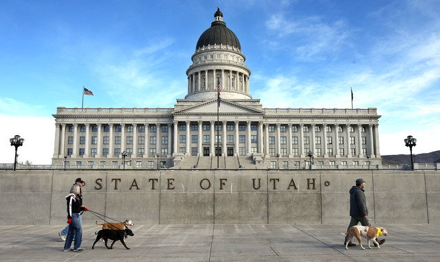 Dog owners and their dogs gather to walk
around the Utah State Capitol Sunday, March 9,
2014 in support of HB-97. (Photo: Scott G
Winterton, Deseret News)